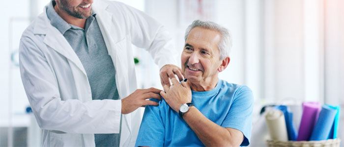 doctor with his hand on patient